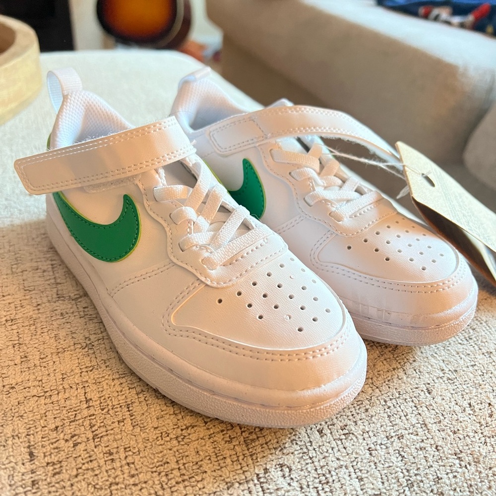 New with tag, kids size 11 Nikes.